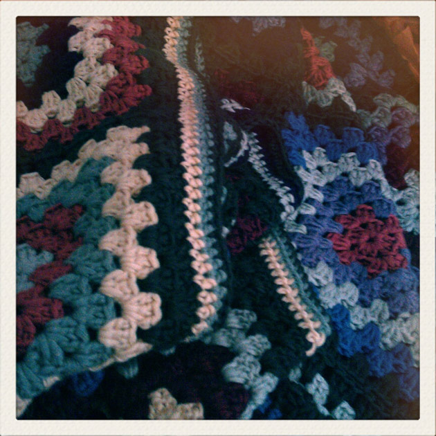 crocheted granny square blanket